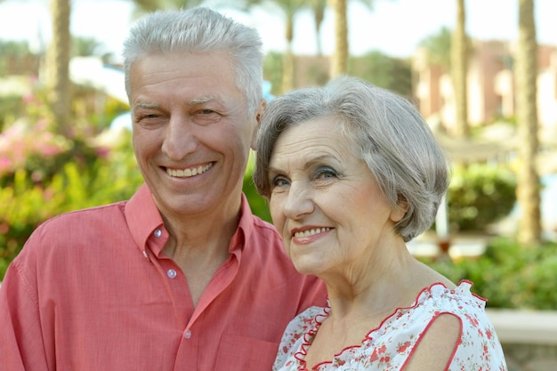 Happy elderly couple embracing