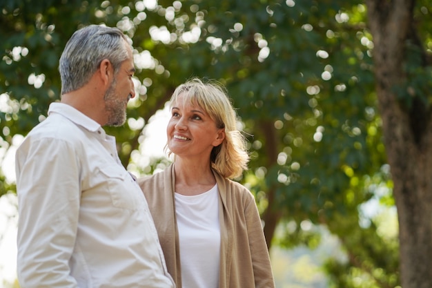 Happy elderly couple looking at each other