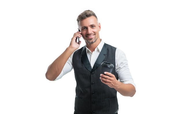 Happy employee talking on mobile phone during coffee break isolated on white