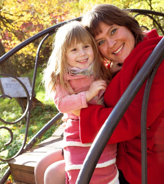 Happy family in autumn park