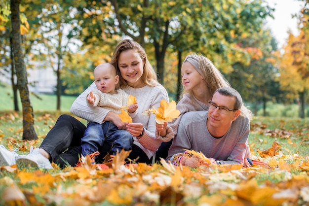 Happy family in an autumn park