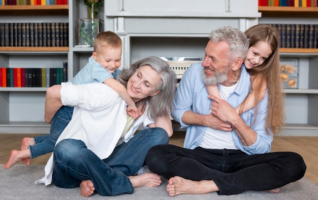 Happy family on carpet full shot