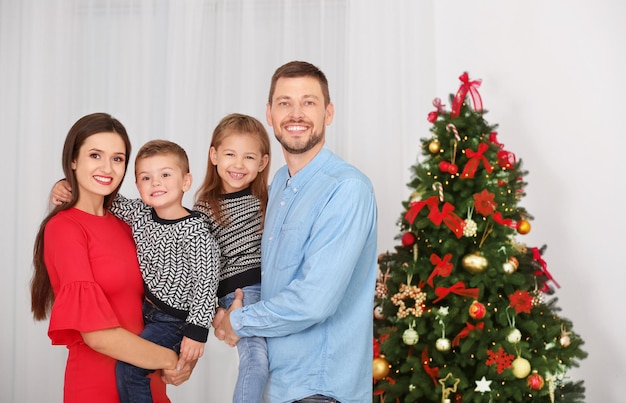 Happy family celebrating Christmas at home