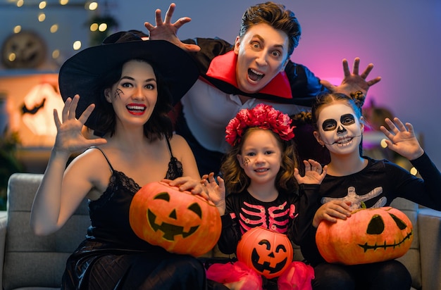 Happy family celebrating Halloween