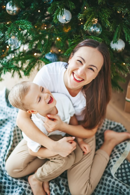 Happy family under the Christmas tree