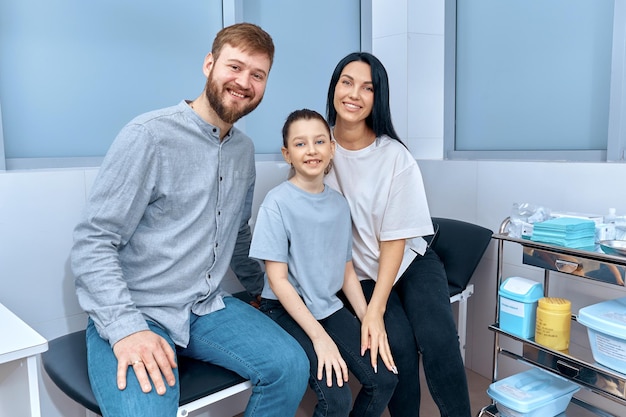 Happy family in the doctor's office