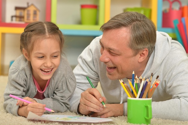 Happy family drawing at home