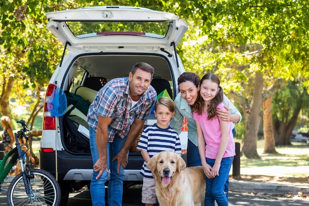 Happy family getting ready for road trip