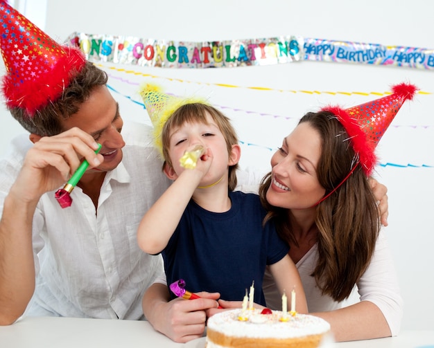 Happy family having fun during a birthday