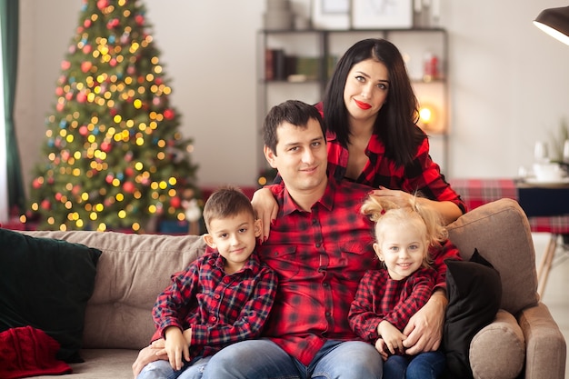 Happy family at home waiting for Christmas