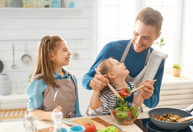 Happy family in the kitchen.