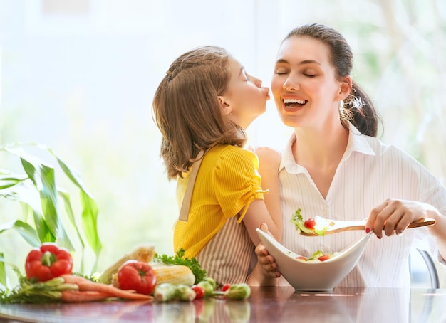 Happy family in the kitchen.