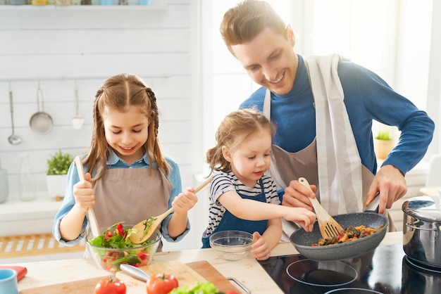 Happy family in the kitchen.