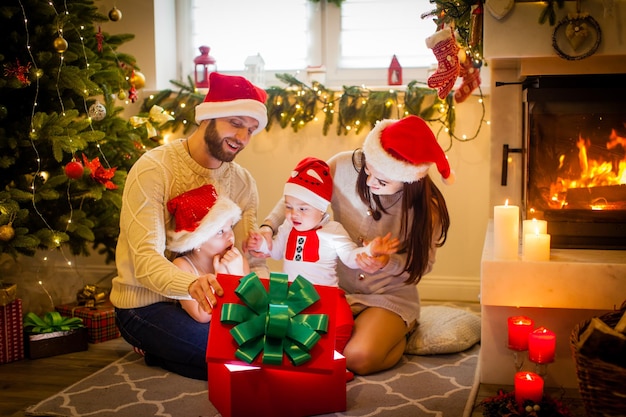 Happy family mother father and children at chriasmtas time