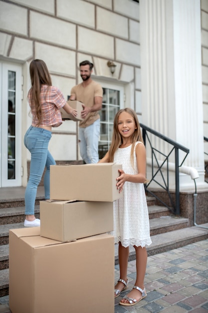 Happy family moving into a new home