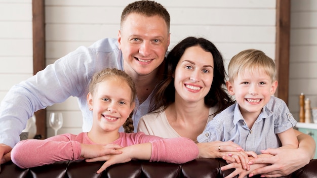 Happy family posing together