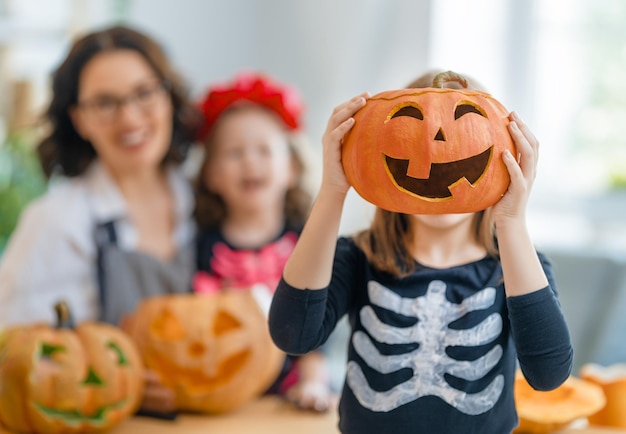 Happy family preparing for Halloween