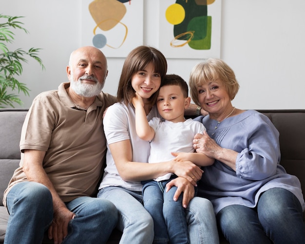 Happy family sitting on couch