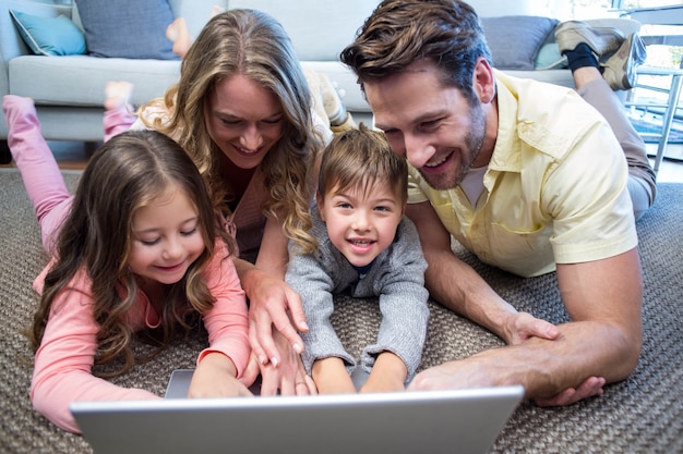 Happy family smiling at camera