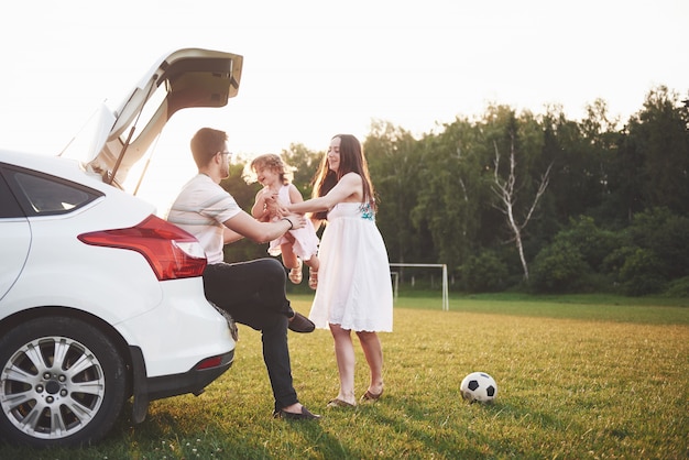 Happy family staying outside