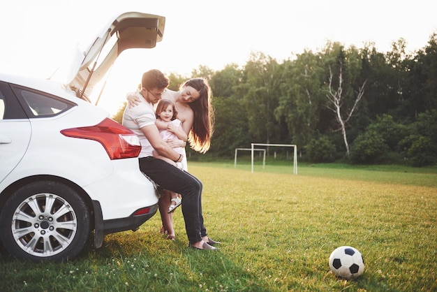 Happy family staying outside