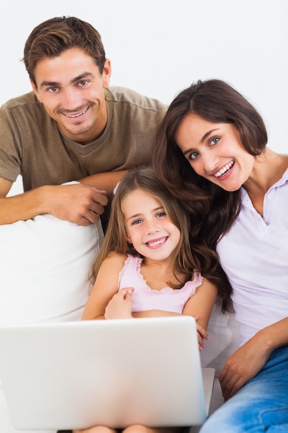 Happy family using the laptop