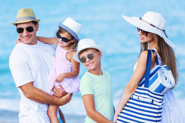 Happy family on vacations on beach