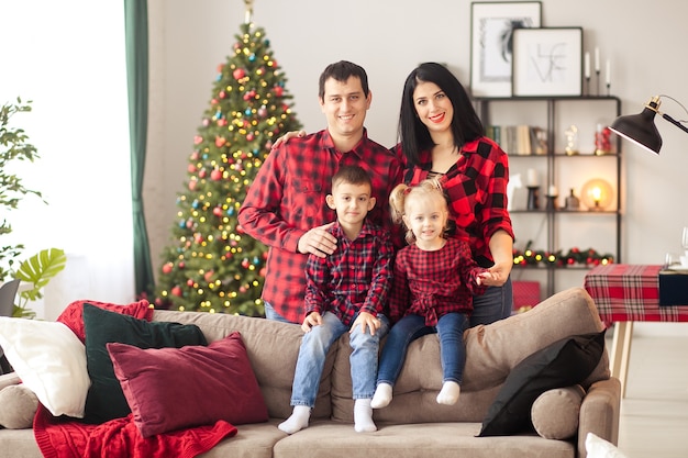 Happy family waiting for new year at home