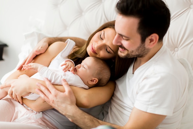 Happy family with newborn baby