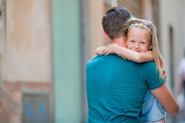 Happy father and little adorable girl in Rome during summer italian vacation