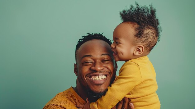 happy father and son pose for a photo