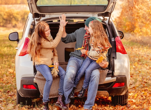 Happy father with daughters