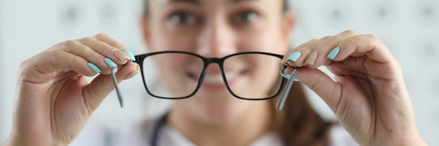 Happy female performing eyesight check