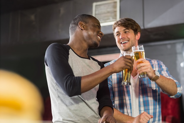 Happy friends having a drink