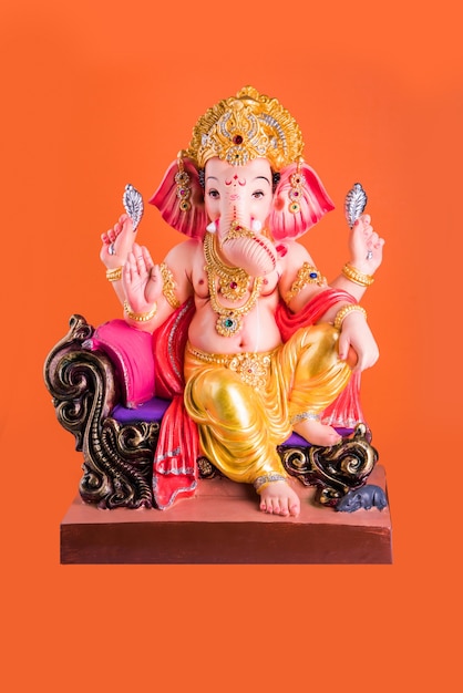 Happy Ganesh Chaturthi greeting card using photograph of Lord ganapati Idol