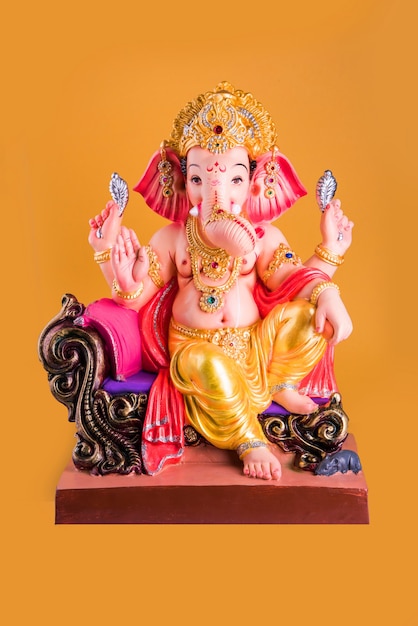 Happy Ganesh Chaturthi greeting card using photograph of Lord ganapati Idol