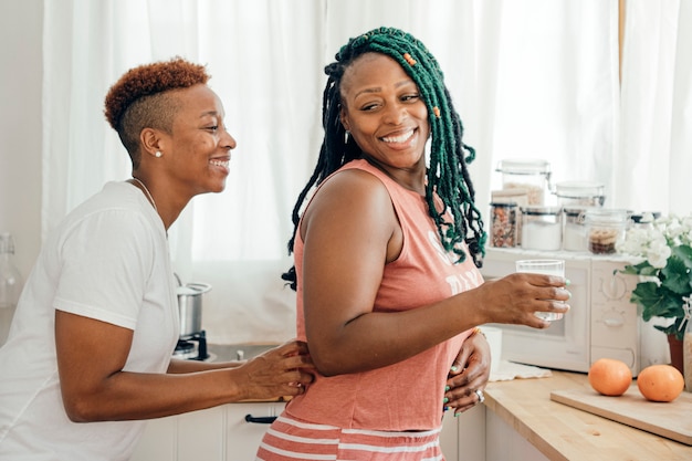 Happy gay couple in the kitchen