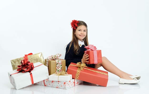 Happy girl with the christmas gifts