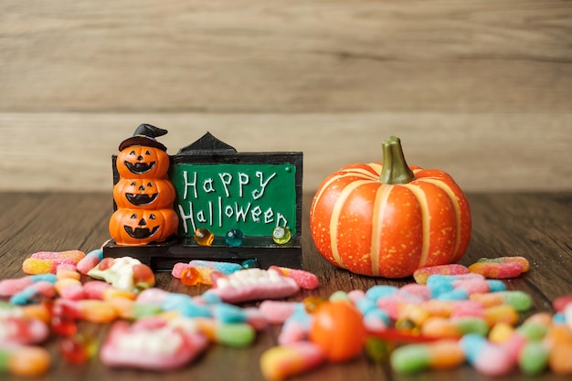 Happy Halloween day with ghost candies pumpkin Jack O lantern and decorative selective focus Trick or Threat Hello October fall autumn Festive party and holiday concept