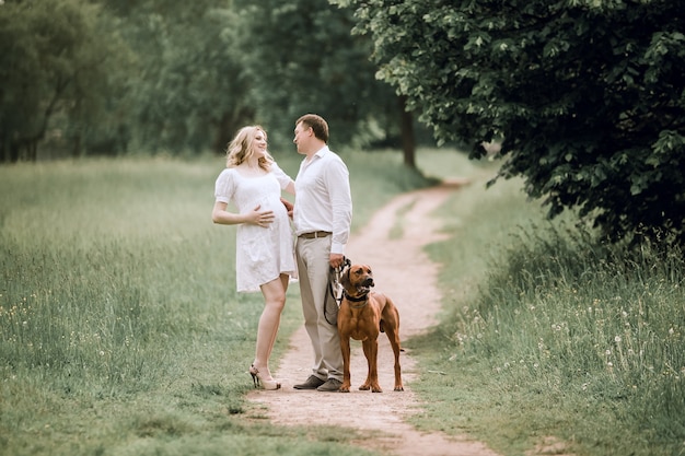 Happy husband and wife talking about something for a walk in the Park. the concept of family relations