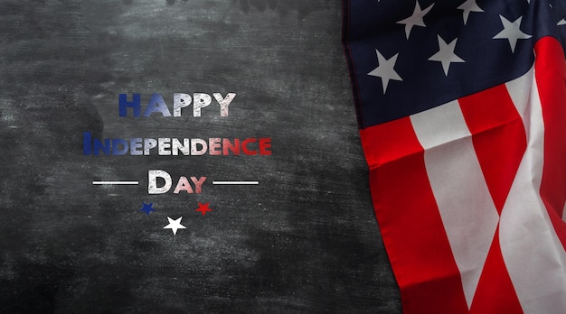 Happy independence day inscription american flag on a chalkboard usa holiday concept