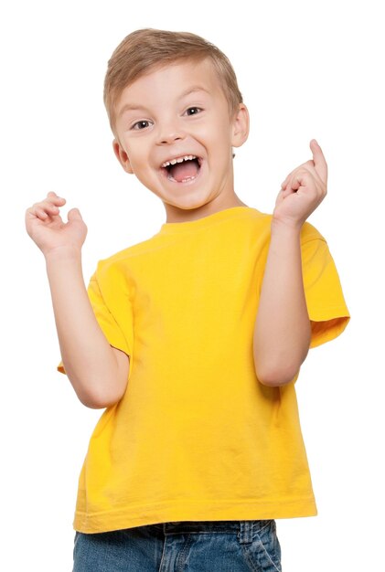 Happy little boy celebrating success over white background