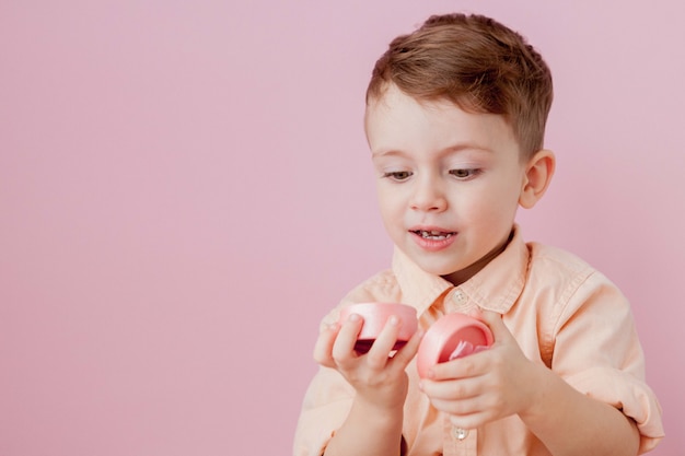 Happy little boy with a gift