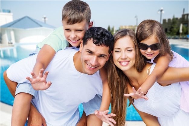 Happy Lovely family near pool