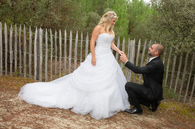 Happy and a lovely wedding couple outside