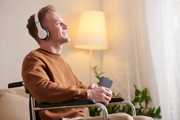 Happy Man Listening to Podcast