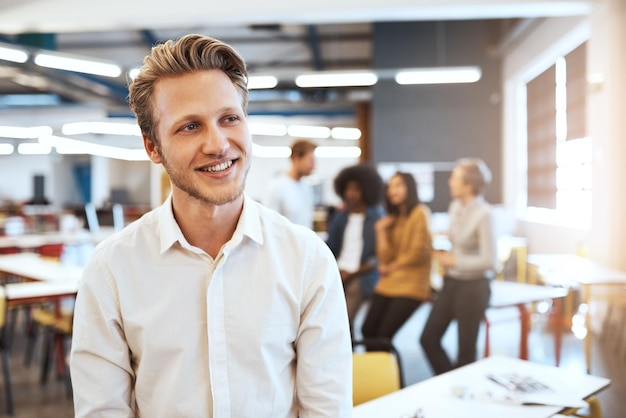 Photo happy man and thinking in office for business meeting and project planning for start up designer idea and dream or positive mindset for career in creative agency with opportunity for development