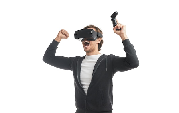 Happy man in VR headset celebrating victory