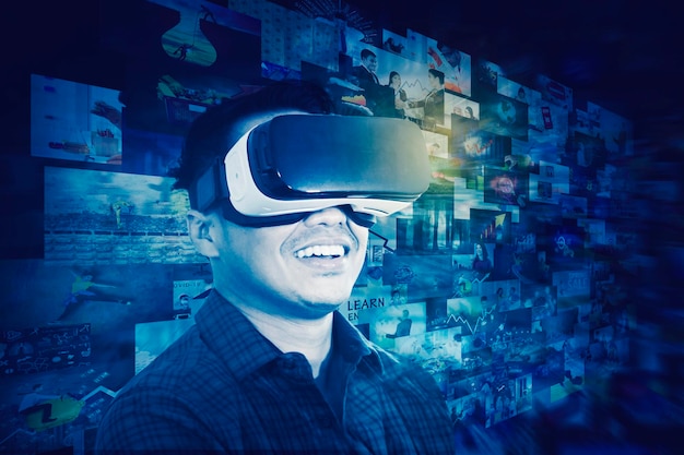 Happy man wearing VR goggles in the cyberspace