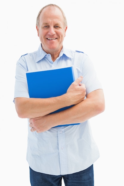 Happy mature student holding folder